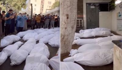 بينهم 7 أطفال خدج.. دفن عشرات الشهداء في "قبر جماعي" بمستشفى الشفاء في غزة